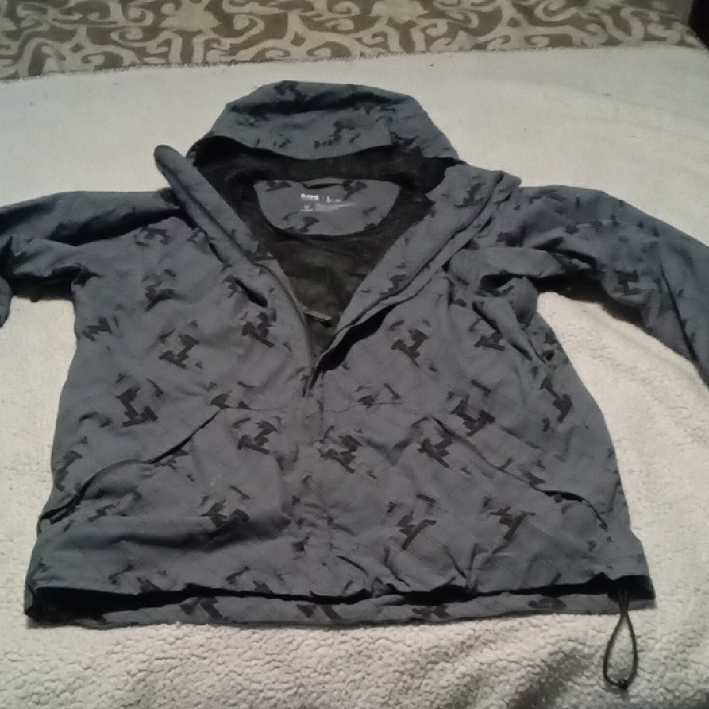 Gray Hooded Jacket with Black Pattern - image 1